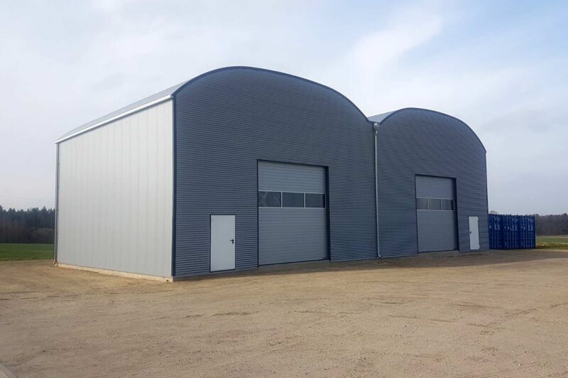 image of steel grey warehouses with roller doors